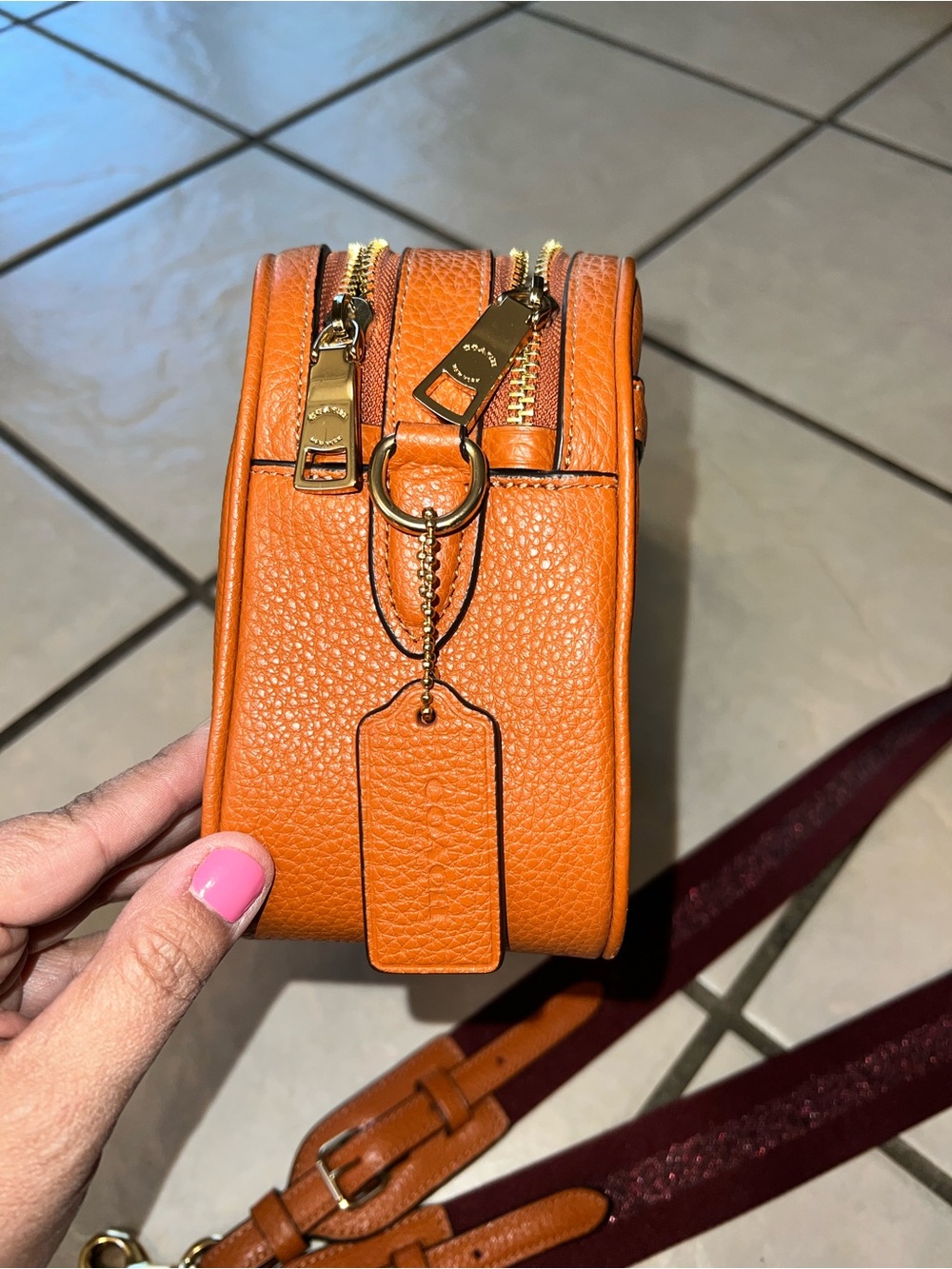 Coach Orange Pebbled Leather Camera Crossbody with Striped Strap - Picture 8 of 10